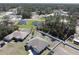 Expansive aerial shot showcases the neighborhood's peaceful scenery, lush trees, and well-spaced homes at 4490 Sw 169Th Pl, Ocala, FL 34473