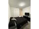 Comfortable bedroom with carpet flooring, closet space, and a black dresser with tv at 4812 Worchester Dr, Kissimmee, FL 34746
