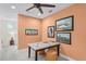A bonus room area with a marble table, seating, and framed art at 510 Captiva Dr, Davenport, FL 33896