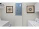 This laundry room offers a utility box, laundry machines, and storage at 510 Captiva Dr, Davenport, FL 33896