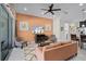 Comfortable living room featuring cozy seating, modern decor, and an open layout with lots of light at 510 Captiva Dr, Davenport, FL 33896