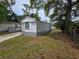 Charming single-Gathering home with a clean exterior, small yard, and plenty of shade at 5161 Howison Rd, Kissimmee, FL 34746