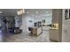 Well-lit kitchen with modern finishes, island seating, stainless appliances, and views to the living room at 5340 Jubiloso Dr, St Cloud, FL 34771