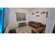 Cozy living room with brown leather couches and a large flat-screen TV at 5340 Jubiloso Dr, St Cloud, FL 34771