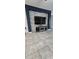 Modern entertainment area features a stone accent wall, recessed lighting, and tile flooring at 5340 Jubiloso Dr, St Cloud, FL 34771