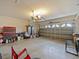 Spacious two-car garage with overhead door and ample storage at 572 Nogales Ct, Kissimmee, FL 34758