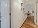 Hallway featuring decorative wall accents and views of the adjacent living spaces at 572 Nogales Ct, Kissimmee, FL 34758
