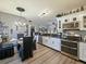 Bright kitchen featuring stainless steel appliances, an eat-in area, and lots of natural light at 572 Nogales Ct, Kissimmee, FL 34758