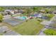 Community amenities including a pool, tennis court, and pond at 5912 Village Cir # Ge, Orlando, FL 32822
