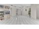 Spacious living area with tile flooring, neutral paint, and a ceiling fan at 5912 Village Cir # Ge, Orlando, FL 32822