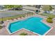Beautiful pool with brick trim, lounge chairs, and steps at 5912 Village Cir # Ge, Orlando, FL 32822