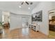 Bright foyer featuring terra cotta tile floors, white trim, and a view into the dining room at 6186 Oak Shore Dr, St Cloud, FL 34771