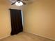 Simple bedroom featuring neutral carpet and a ceiling fan to ensure a cozy and relaxing atmosphere at 633 Cypress Tree Ct, Orlando, FL 32825
