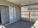 Screened patio with sliding glass doors provides an enjoyable outdoor space overlooking a fenced yard at 633 Cypress Tree Ct, Orlando, FL 32825