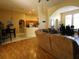 Open-concept living space flows seamlessly into the kitchen and dining areas at 742 Chamberlin Trl, St Cloud, FL 34772