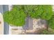 Aerial view showcases the home's roof, tree coverage and surrounding neighborhood at 9513 Bahia Rd, Ocala, FL 34472