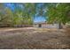 Large backyard with a privacy fence creates a peaceful outdoor retreat at 9513 Bahia Rd, Ocala, FL 34472