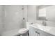 Modern bathroom featuring new tile in the shower and updated vanity at 9513 Bahia Rd, Ocala, FL 34472