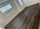 Bedroom featuring vinyl plank floors and abundant natural light from windows at 11713 Tidal Alley Trl, Orlando, FL 32832