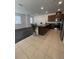 Modern kitchen with stainless steel appliances and granite countertops at 11713 Tidal Alley Trl, Orlando, FL 32832