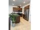 Kitchen showcasing stainless steel appliances and granite countertops at 11713 Tidal Alley Trl, Orlando, FL 32832