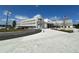 Exterior view of Innovation High School with parking and landscaping at 11713 Tidal Alley Trl, Orlando, FL 32832