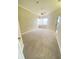 Large bedroom with neutral carpet, a ceiling fan, and a window for natural light at 14313 Dulcimer Ct, Orlando, FL 32837