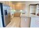 Modern kitchen with stainless steel appliances, granite countertops, and a center island at 14313 Dulcimer Ct, Orlando, FL 32837