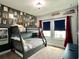This charming bedroom features bunk beds and fun decor, creating a playful and inviting space at 236 Villa Domani Cir, Davenport, FL 33896