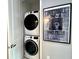 Modern laundry machines on display with Harry Potter art on the wall at 236 Villa Domani Cir, Davenport, FL 33896