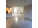 Spacious living room with tile floors, neutral paint, and modern lighting at 3351 Whitestone Cir # 101, Kissimmee, FL 34741