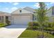 Charming single-story home with a two-car garage, well-manicured lawn, and tasteful landscaping at 6389 Clover St, Lake Hamilton, FL 33851