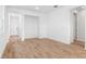 Open-concept living room featuring beautiful tile floors and ample natural light at 6389 Clover St, Lake Hamilton, FL 33851