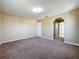 Large carpeted bedroom with en suite bathroom and walk in closet at 205 Minniehaha Cir, Haines City, FL 33844