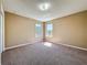 Neutral bedroom with carpet, natural light from double windows at 205 Minniehaha Cir, Haines City, FL 33844