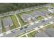 Aerial view of neighborhood streets and residences with well-manicured lawns and mature trees at 2943 Sunstar Dr, St Cloud, FL 34772