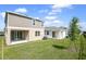 Exterior elevation features a manicured lawn at 6381 Clover St, Lake Hamilton, FL 33851