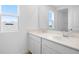 Bathroom features double sink vanity and a large mirror at 6381 Clover St, Lake Hamilton, FL 33851