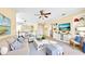 Bright living room featuring a comfortable seating arrangement and decor at 1251 Radiant St, Reunion, FL 34747