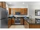 Well-appointed kitchen features sleek countertops, modern appliances, and ample cabinet space at 2618 Roadster Ln, Kissimmee, FL 34746
