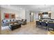 Spacious and bright open-concept living space, seamlessly connecting the living, dining, and kitchen areas at 2618 Roadster Ln, Kissimmee, FL 34746