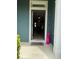 Charming front door entrance with 'Welcome' mat and a bright pink bunny offering a warm invitation at 4710 Nathan Hale Blvd, St Cloud, FL 34769