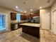 Modern kitchen with granite countertops, stainless steel appliances, and a center island at 4710 Nathan Hale Blvd, St Cloud, FL 34769