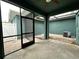 Private outdoor patio with screened door and brick pavers at 4710 Nathan Hale Blvd, St Cloud, FL 34769
