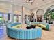 Bright condo lobby featuring stylish seating arrangements and modern décor for a welcoming atmosphere at 5012 Shoreway Loop # 205, Orlando, FL 32819