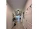 Well decorated entryway featuring contemporary decor and neutral color palette at 9083 Coral Cape St, Kissimmee, FL 34747