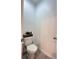 Small toilet area with decorations at 9083 Coral Cape St, Kissimmee, FL 34747