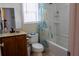 Bathroom features vanity, toilet and shower/tub combination at , Kissimmee, FL 34744