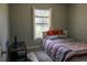 Bedroom featuring small bed, wood look flooring and window at , Kissimmee, FL 34744