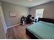 Bedroom features a desk, computer and full sized bed at , Kissimmee, FL 34744